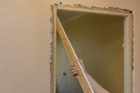 Repair dismantling of the removing old door apartment in construction finishing work