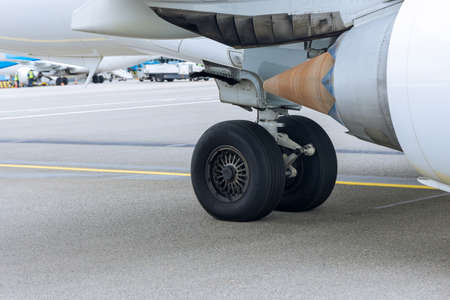 Close up view wheel of airplane for airportの写真素材