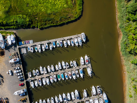 Aerial top view of the many small boats in American harbor at ocean portの写真素材