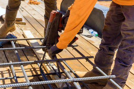 For cement foundations, this tool is used to tie steel bars twisting reinforcement with wire rods