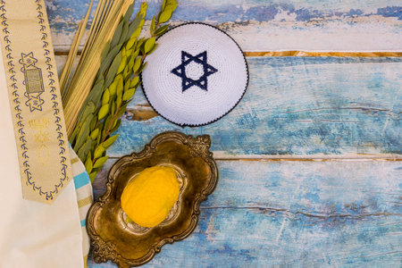 Traditions Jewish holiday celebration of Sukkot amassed with the symbolic elements of etrog, lulav, hadas, and aravaの写真素材