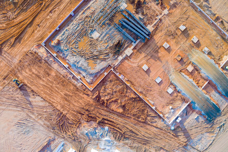 Bulldozer is working on site of construction project preparing land for construction new building...