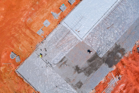 Polyethylene should be laid for waterproofing before concrete is poured on foundationの写真素材