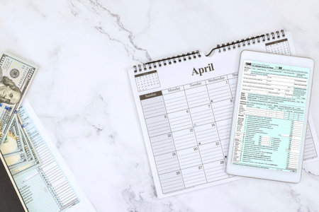 Time for tax season with 1040 form for federal individual income taxes in USの写真素材
