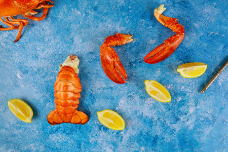 It is delicious to eat lobster and lemon on table, freshly cooked to perfectionの写真素材
