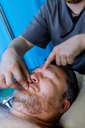 Work of masseur involves using manual techniques to alleviate muscle tension promote relaxationの写真素材