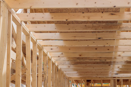 Framework of wooden house is carefully designed to meet structural requirements ensure safety...