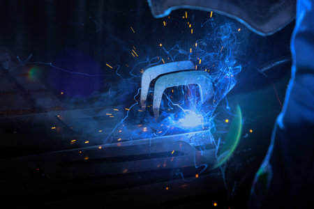 Professional worker welder employs semi automatic argon arc welding methods for welding operations.