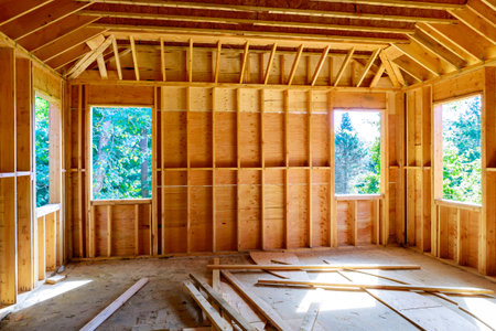 Wooden elements interior view of new house under construction with framing beams