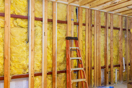 Fiber cotton thermal insulation to installing mineral wool wall new buildingの写真素材