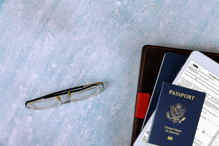 American passport, US Return of Partnership Income Tax Form 1065 with online form filling tax periodの写真素材