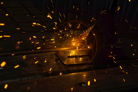 Sparks are generated during welding process of argon gas to steel at factory