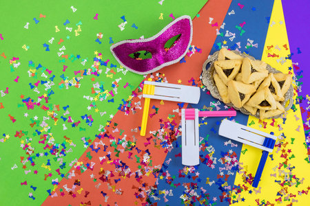 Jewish holiday of remembrance Purim tradition attributes symbols such as carnival mask, hamantaschen cookies to festivalの写真素材