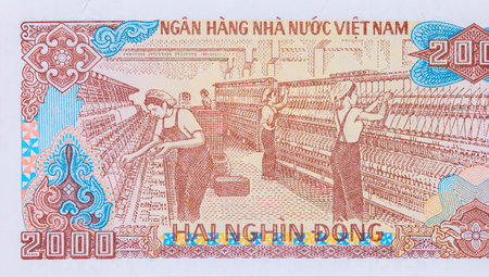 Two thousand Dong paper currency banknote is issued by Viet Nam National Bank in different denominations rear viewの写真素材