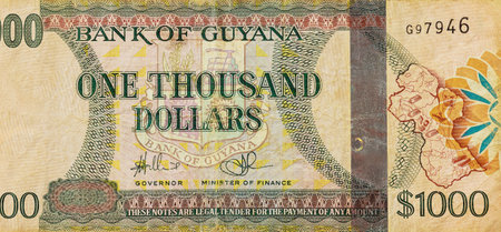 One thousand Guyanese dollars bank denominations note is national currency of Guyana front viewの写真素材