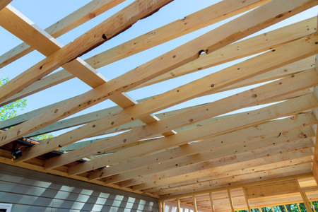 Installing framing beams wooden trusses during renovations to house