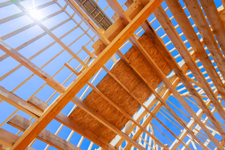 Build wooden roof beams from trusses frames with rafters joistsの写真素材