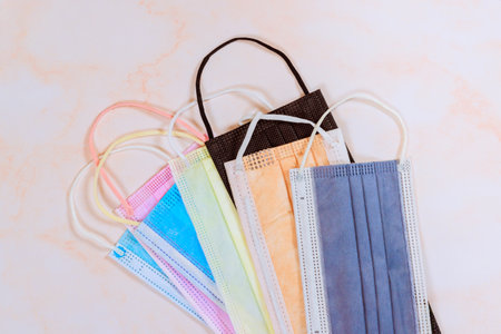 In event of pandemic disease, medical protective face masks in variety of colors provide protection to patientsの写真素材