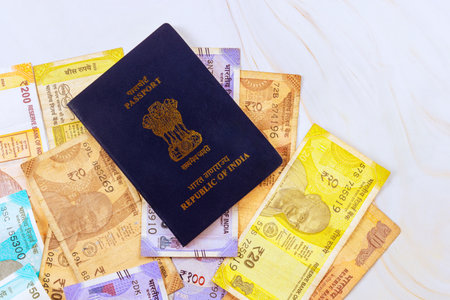 Republic of India passport on Indian rupees various denomination currency banknotes cash