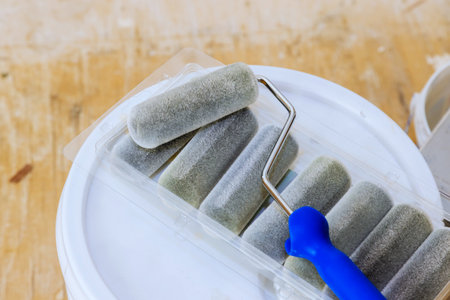 Rollers with handle are ready for painting wallsの写真素材