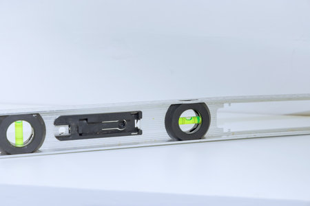 Construction level tool used in construction, showing bubble indicating precise leveling alignment...
