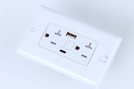 Electrical outlet features multiple sockets USB charging ports, providing convenient Self Test GFI...