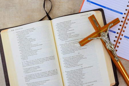 24 April 2025 Washington DC US Open Holy Bible lays open with highlighted verses next to wooden...
