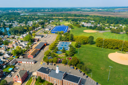 Landscape of Sayreville, Middlesex County, featuring blue football stadium, multiple sports fields, parking areas, residential neighborhoods, residential zones.の写真素材