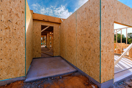 Workers are busy constructing home, walls open spaces on during build new house