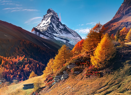 Matterhorn peak with colorful autumn forest in Zermatt, Switzerlandの素材