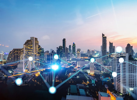 Smart city and wireless communication network over blurred cityscape background, Technology conceptの素材