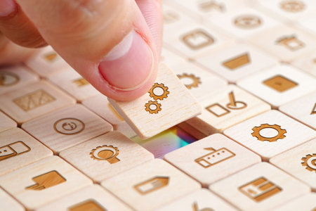 Placing gear icon block. Grid of blocks. Business solutions.の素材