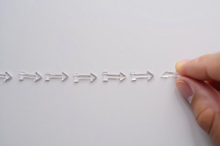 Pushing transparent arrow. Aligning arrows representing direction, strategy.の素材