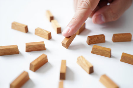 Selecting block. Strategy and planning. Choice on white surface.の素材