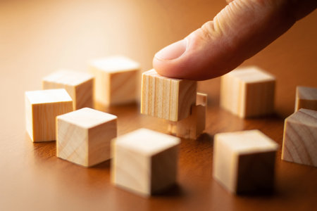 Hand setting cube. Strategic arrangement. Selection concept. Planning.の素材