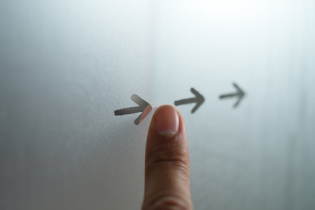 Pointing at arrows. Following direction. Path forward concept choice.の素材