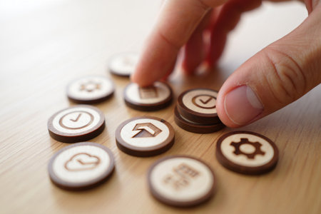 Hand moves token. Round circle with check mark design. Task management.の素材