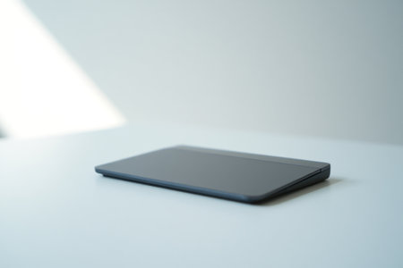 Compact wireless keyboard for portability. Computer accessory for travel or desk use.の素材