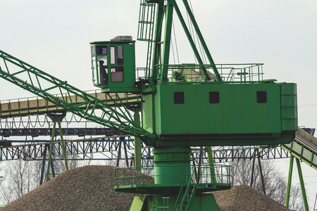 Green crane in a small Dutch harborの写真素材