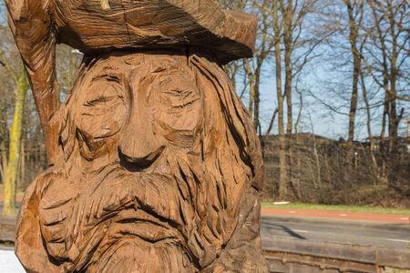 Wooden figure sculptured with a chain sawの写真素材