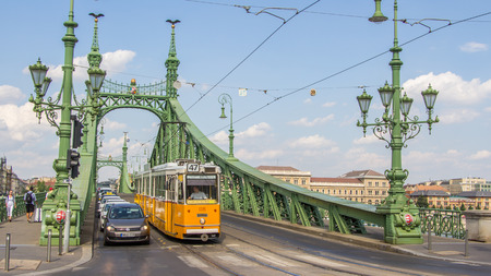 BUDAPEST, HUNGARY, - JULY 21, 2015:  Historic tram at the Liberty bridge in Budapest Hungaryのeditorial素材