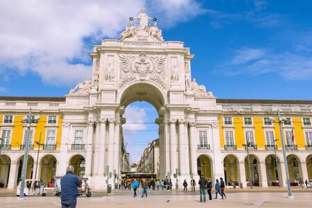 LiSBON, PORTUGAL - March 5, 2016: : Man admiring the famous arch at the Praca do Comercio showing Viriatus, Vasco da Gama, Pombal and Nuno Alvares Pereiraのeditorial素材