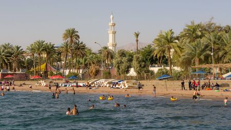 AQABA, JORDAN- MAY 01, 2016: Swimming at the beach of Aqaba in Jordan.のeditorial素材