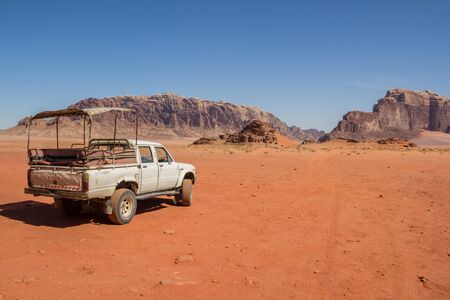 WADI RUM DESERT, JORDAN - APRIL 30, 2016: Tourist truck in Wadi Rum desert - Valley of the Moon in Jordan. UNESCO World Heritage.のeditorial素材