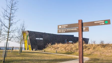 ALMERE, NETHERLANDS - MARCH 17, 2016: Visitor center Oostvaarders in NP Oostvaardersplassen, a large wild reserve with wetland and  large groups of konik horses and red deer.のeditorial素材
