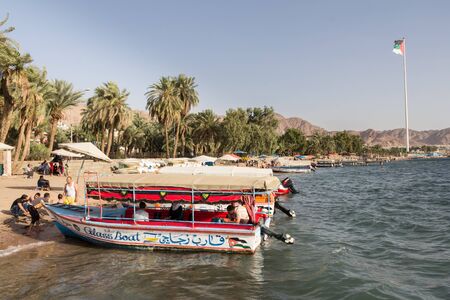 AQABA, JORDAN- MAY 01, 2016: Glass boats for rent at the beach of Aqaba in Jordan.のeditorial素材