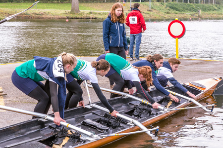 Students preparing for a rowing match on the Bosbaan in Amsterdan Holland.のeditorial素材