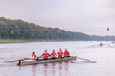 Students preparing for a rowing match on the Bosbaan in Amsterdan Holland.のeditorial素材