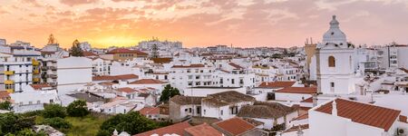 Sunrise panorama ancient town centre of Lagos, Algarve, Portugalの写真素材