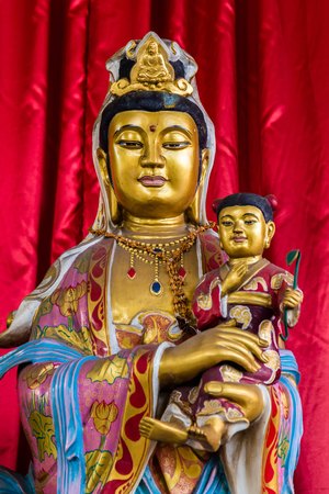 Buddha statue in Vihara Watugong  Chinese Buddhist temple in Semarang, Central Java, Indonesiaのeditorial素材